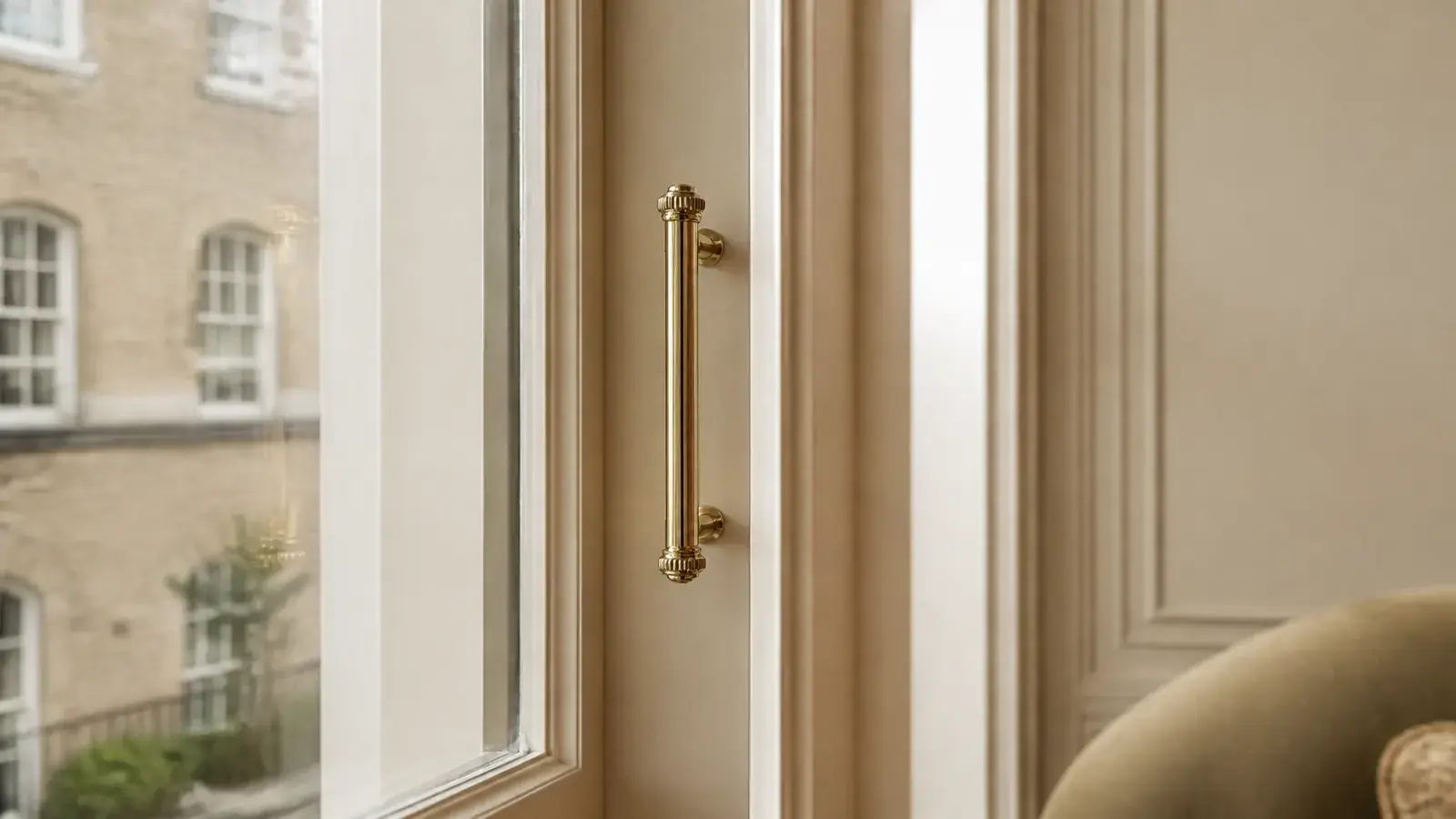 Minimalist lift-out secondary glazing panel handle in a refined period interior Minimalist lift-out secondary glazing panel handle in a refined period interior