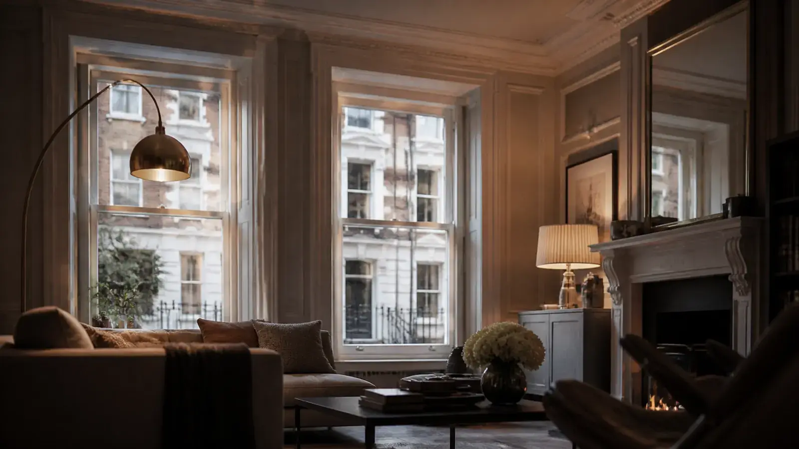 Warm heritage London interior with original sash windows and discreet acoustic secondary glazing