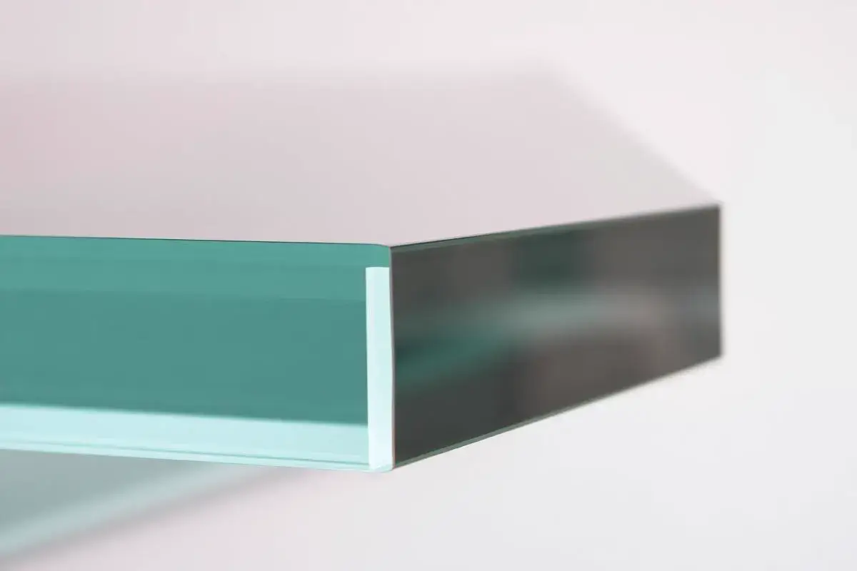 Close-up of 10.8mm acoustic laminate glass layers showing PVB interlayer for soundproof secondary glazing London Close-up of 10.8mm acoustic laminate glass layers showing PVB interlayer for soundproof secondary glazing London