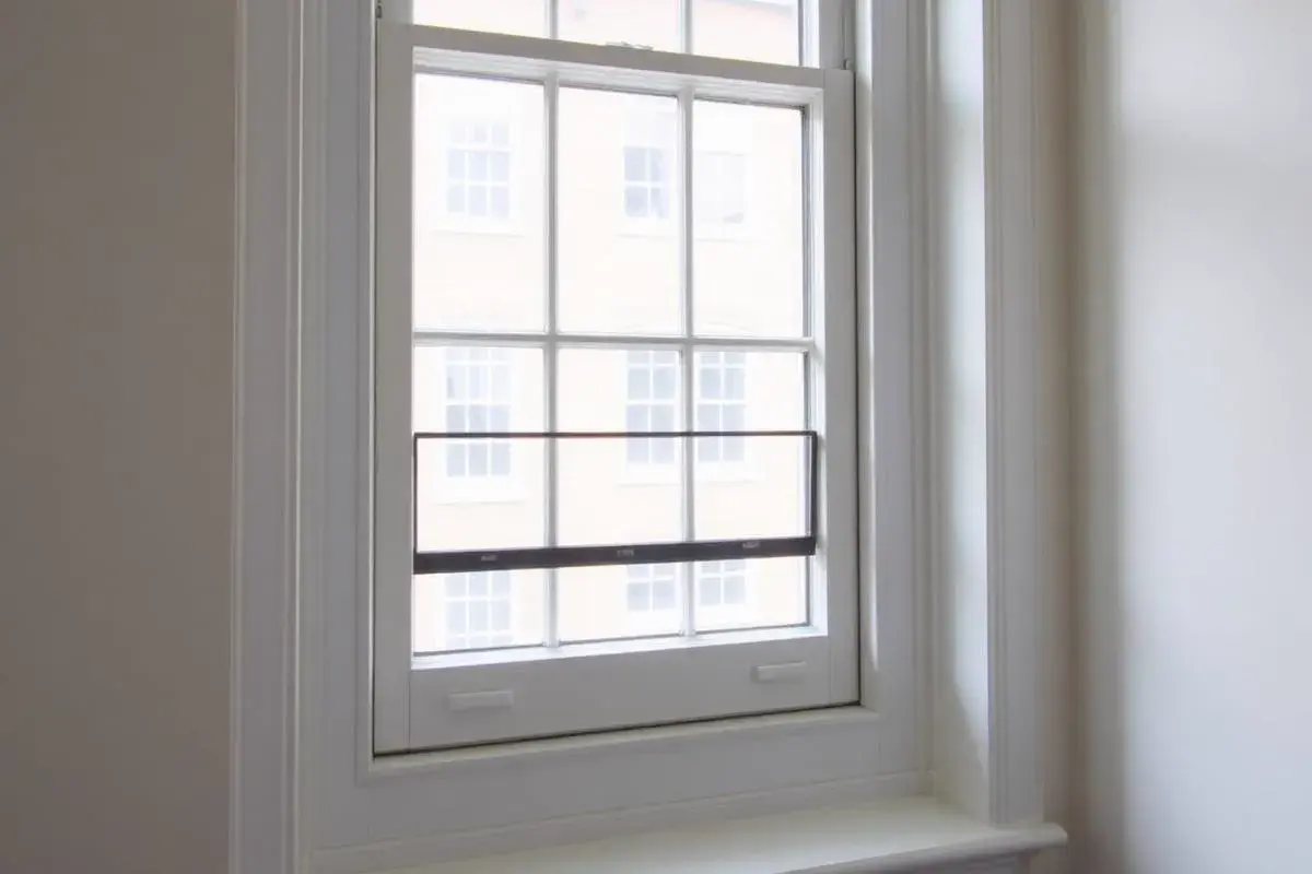 Grade II listed London townhouse interior fitted with reversible secondary glazing behind original sashes
