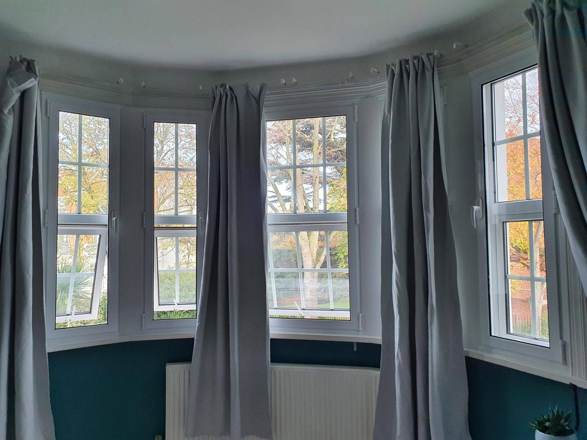 Elegant Kensington townhouse drawing room with period features and discreet secondary glazing installation