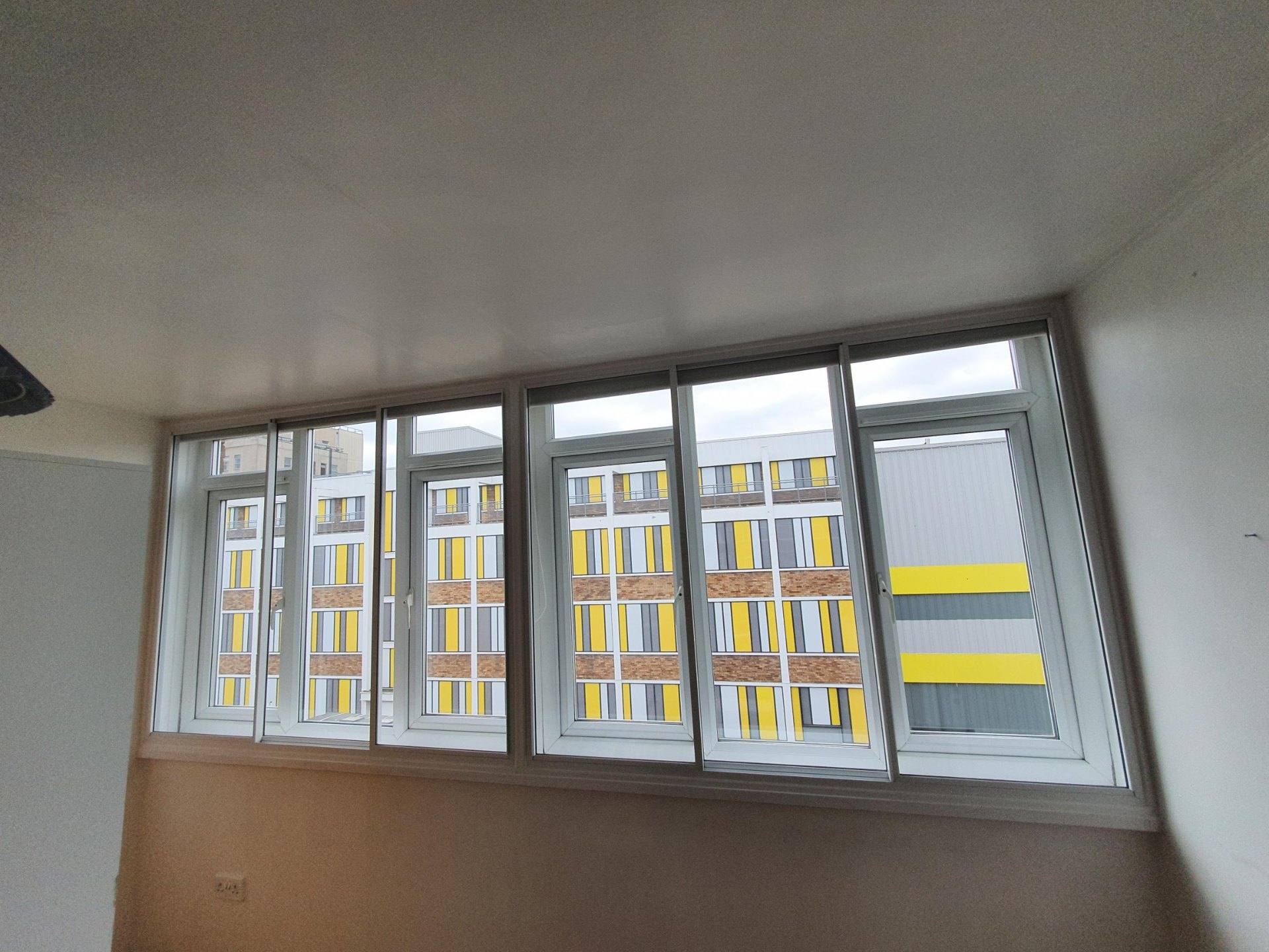 Richmond home bedroom with soundproofed windows providing protection from aircraft noise